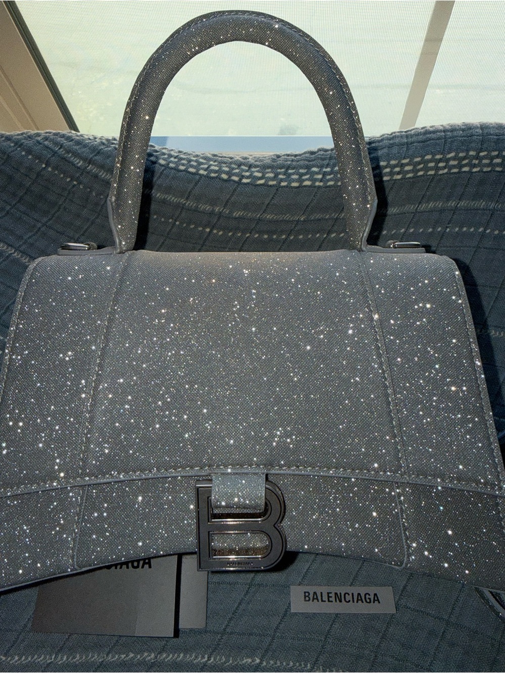 BALENCIAGA
Silver Glitter Fabric Hourglass Small Top Handle Bag